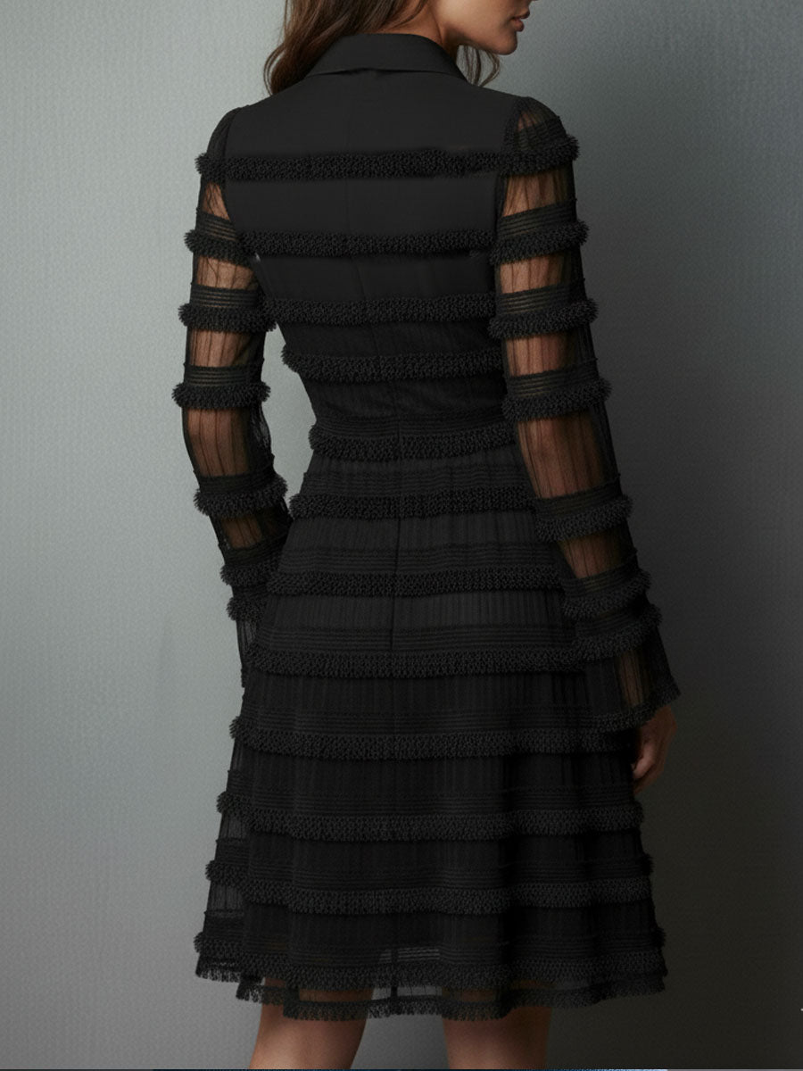 ALBERTA | Vestido Negro con Cuello Camisero, Mangas Transparentes y Falda de Volantes con Flecos