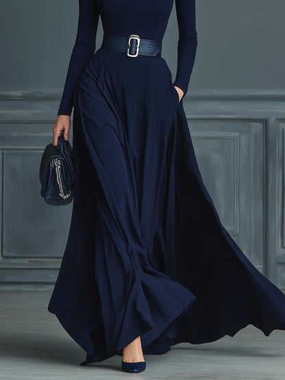ANA | Vestido Largo de Punto Azul Oscuro con Cuello Alto y Falda Acampanada