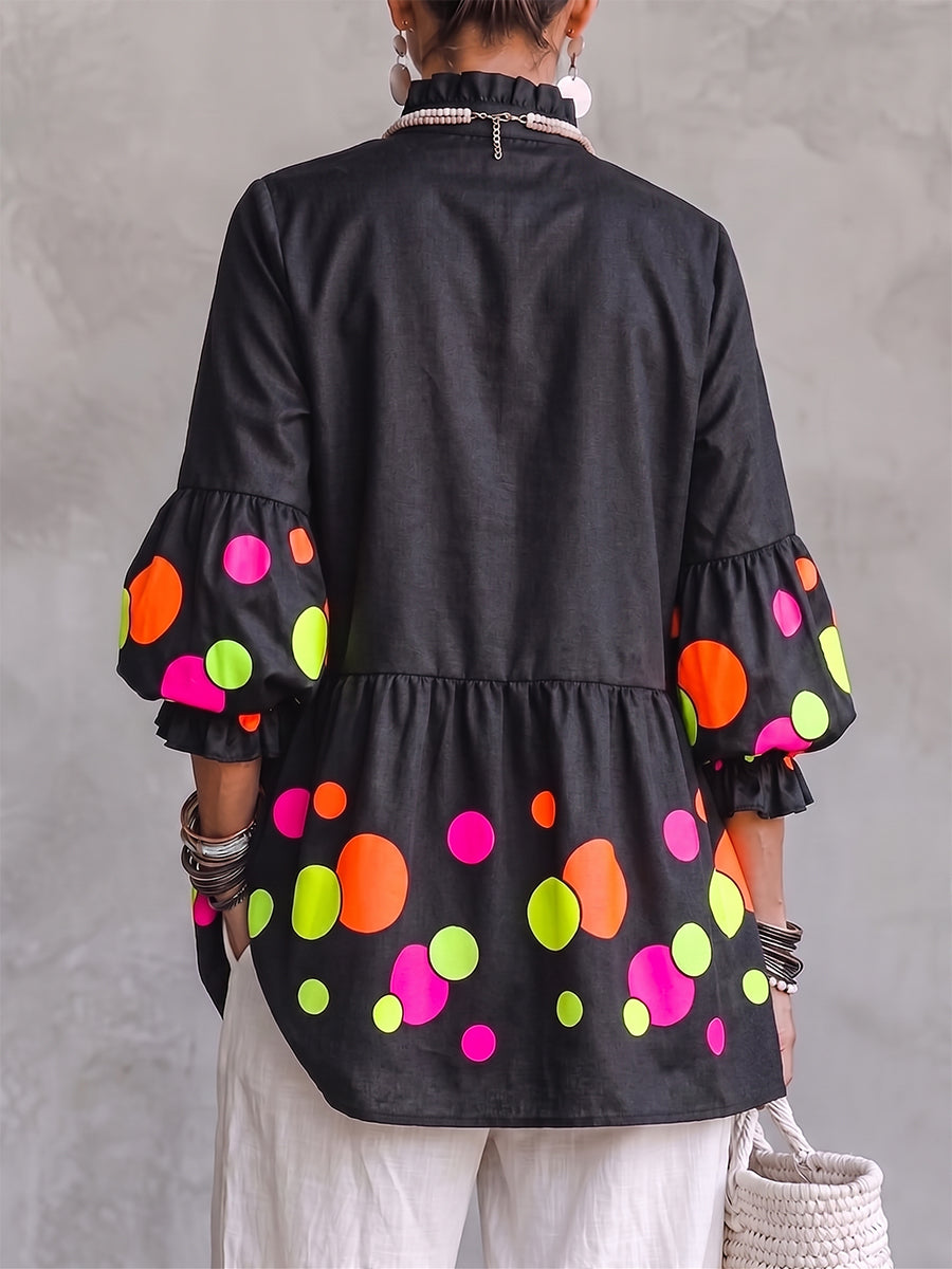 JOSEFINA | Blusa Péplum Negra de Lunares Flúor con Mangas Abullonadas